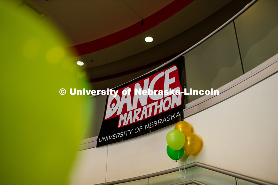 Dance marathon sign and balloons adorn the stairwell in the Nebraska Union. University of Nebraska–Lincoln students exceeded their goal, raising $235,229 during the annual HuskerThon on Feb. 29. Also known as Dance Marathon, the event is part of a nationwide fundraiser supporting Children’s Miracle Network Hospitals. The annual event, which launched in 2006, is the largest student philanthropic event on campus. The mission of the event encourages participants to, “dance for those who can’t.” All funds collected by the Huskers benefit the Children’s Hospital and Medical Center in Omaha. February 29, 2020. Photo by Justin Mohling / University Communication.