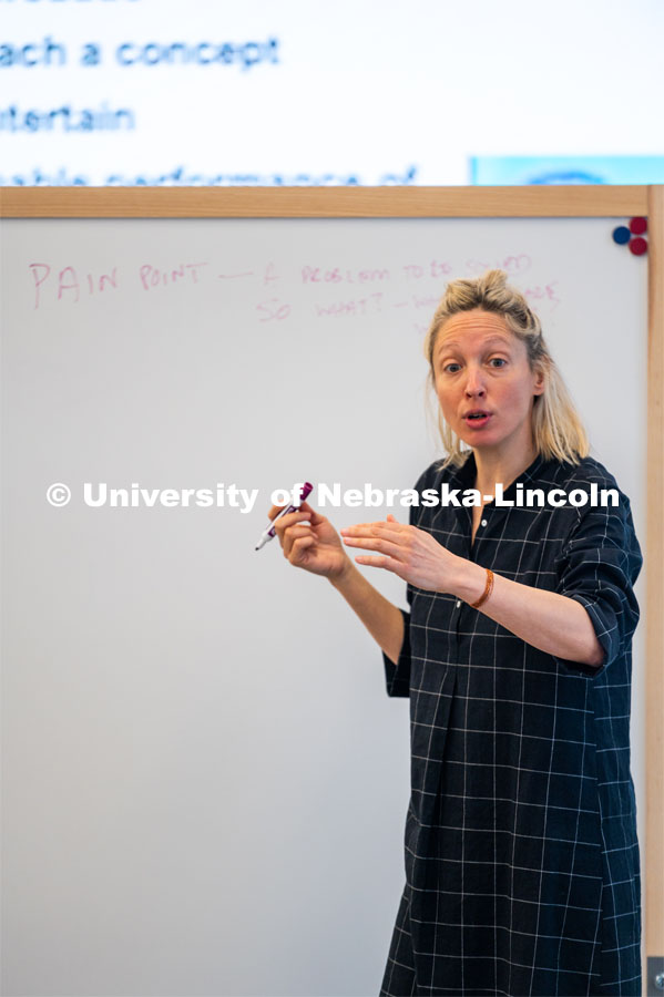 Assistant Professor Ash Smith writes on a marker board. Johnny Carson Center for Emerging Media Arts classes. March 9, 2020. Photo by Justin Mohling / University Communication.