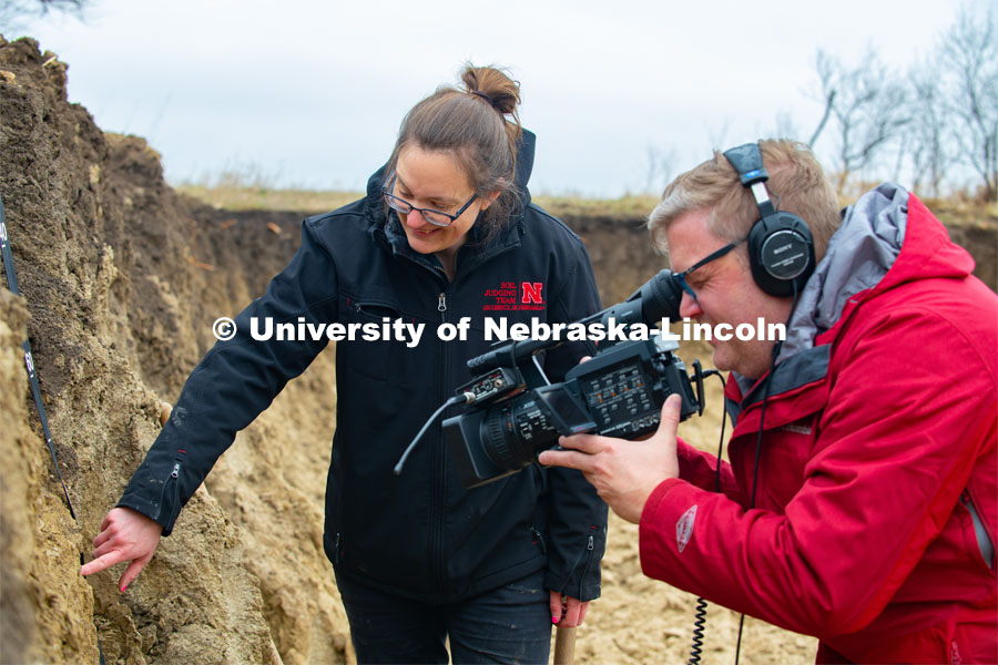Judith Turk and Rebecca Young (stocking hat), assistant professors of natural resources, are being videoed by Curtis Bright, Broadcast Specialist University Communication. Like other campus instructors, Turk and Young are using video as a teaching mechanism to transition a lab course to remote access learning. March 24, 2020. Photo by Gregory Nathan University Communication.