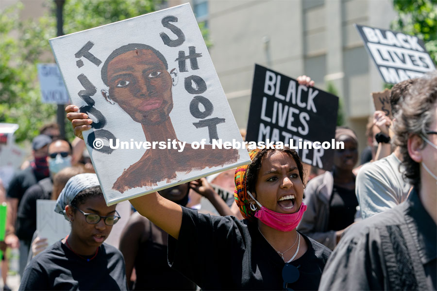 Batool Ibrahim leads protestors in chants as they march from the Nebraska State Capitol to Andersen Hall on Saturday, June 13th, 2020, in Lincoln, Nebraska. Black Lives Matter Protest. Photo by Jordan Opp for University Communication.