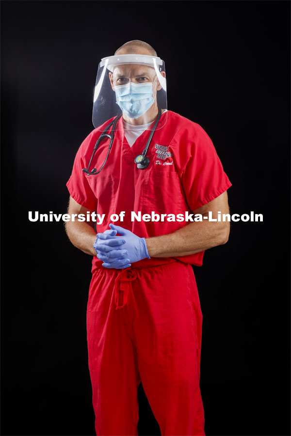 Chad Duval, an emergency physician with Nebraska Emergency Medicine, wears a face shield made at Innovation Campus. He wears the shields in his work at Bryan Hospital. Photo for the 2019-2020 Report Representing Nebraska’s Research Heroes. July 2, 2020. Photo by Craig Chandler / University Communication.