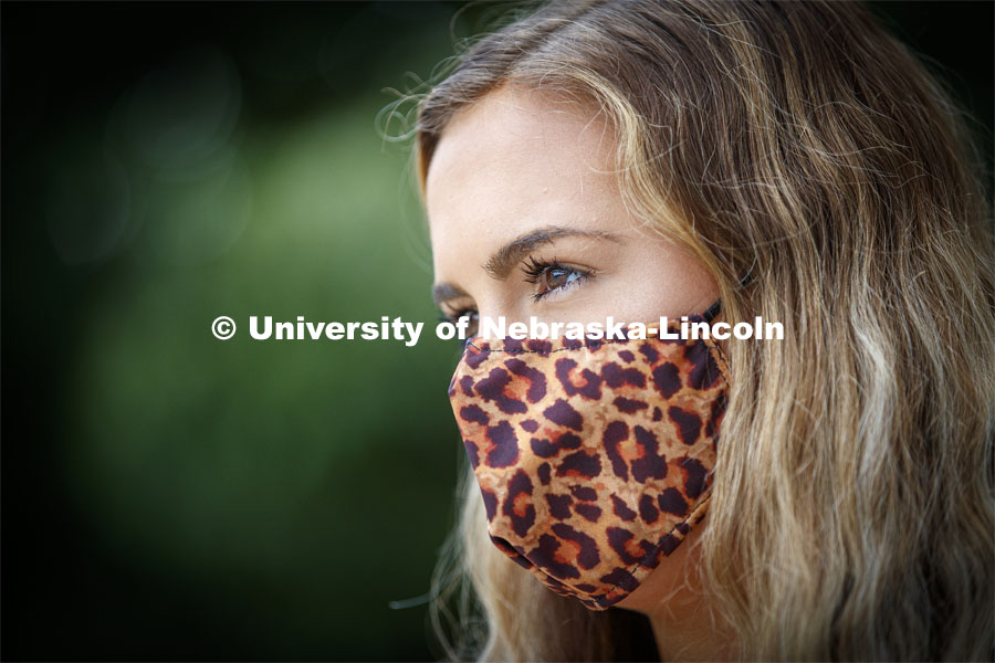 Emily Lenser, sophomore in pre-health, wears a leopard print mask.  August 6 , 2020 Photo by Craig Chandler / University Communication