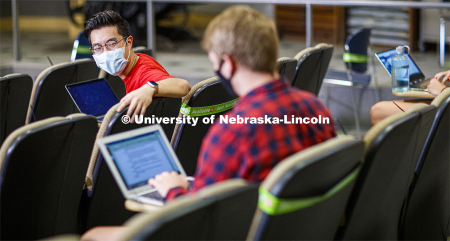 Masked students in an Anderson Hall Lecture Hall are seated for social distancing. Photo shoot of students wearing masks and practicing social distancing. August 11, 2020 Photo by Craig Chandler / University Communication.