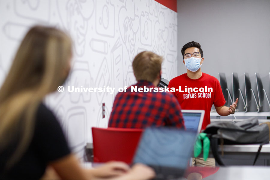 Students wear masks as they study in the Lynn and Dana Roper Media Studio in Anderson Hall. Photo shoot of students wearing masks and practicing social distancing. August 11, 2020 Photo by Craig Chandler / University Communication.