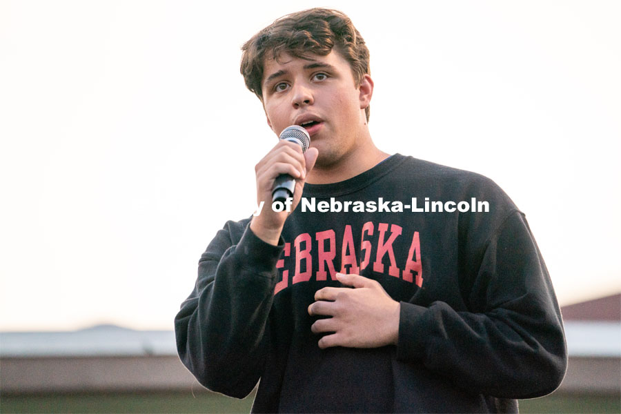 Freshman Will Green sings during the HuskerMania Masker Singer event at Mabel Lee Fields. August 21, 2020. Photo by Jordan Opp for University Communication.