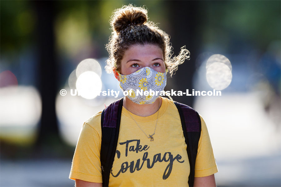 Students are masked up as they cross campus to get to their classes. First day for in-person learning for the fall semester. August 24, 2020. Photo by Craig Chandler / University Communication.