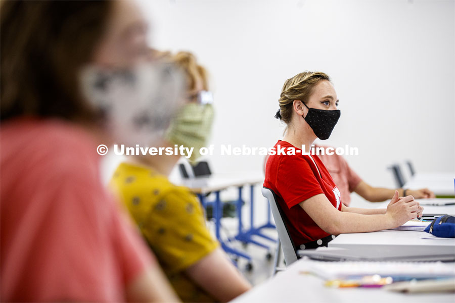 Kayla LaPoure listens to Anna Henson teach her Principles of Interactivity course in the Carson Center Monday afternoon. First day for in-person learning for the fall semester. August 24, 2020. Photo by Craig Chandler / University Communication.