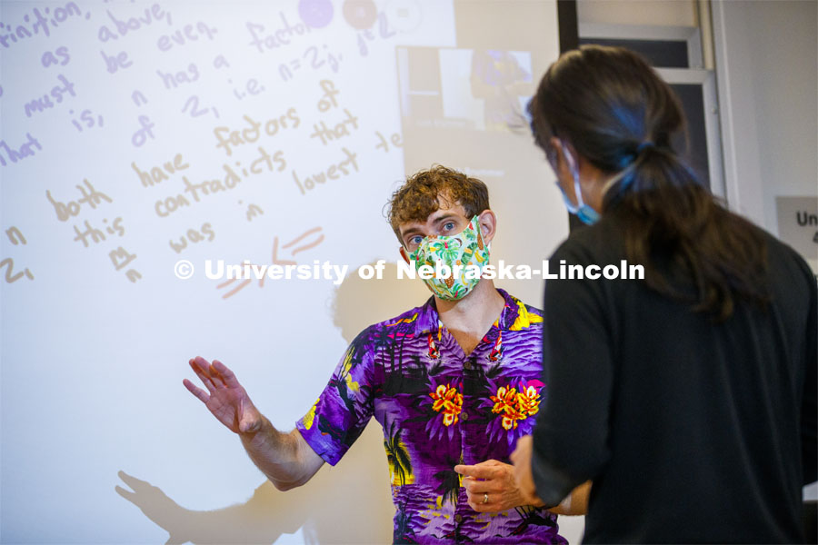 Associate Professor, Josh Brummer livens up his Math 309 class by teaching in a Hawaiian shirt and complimentary mask. August 31, 2020. Photo by Craig Chandler / University Communication