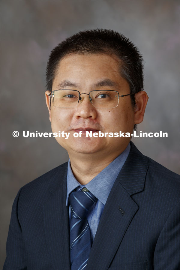 Studio portrait of Qiuming Yao, Assistant Professor, Computer Science and Engineering in College of Engineering. September 2, 2020. Photo by Craig Chandler / University Communication.