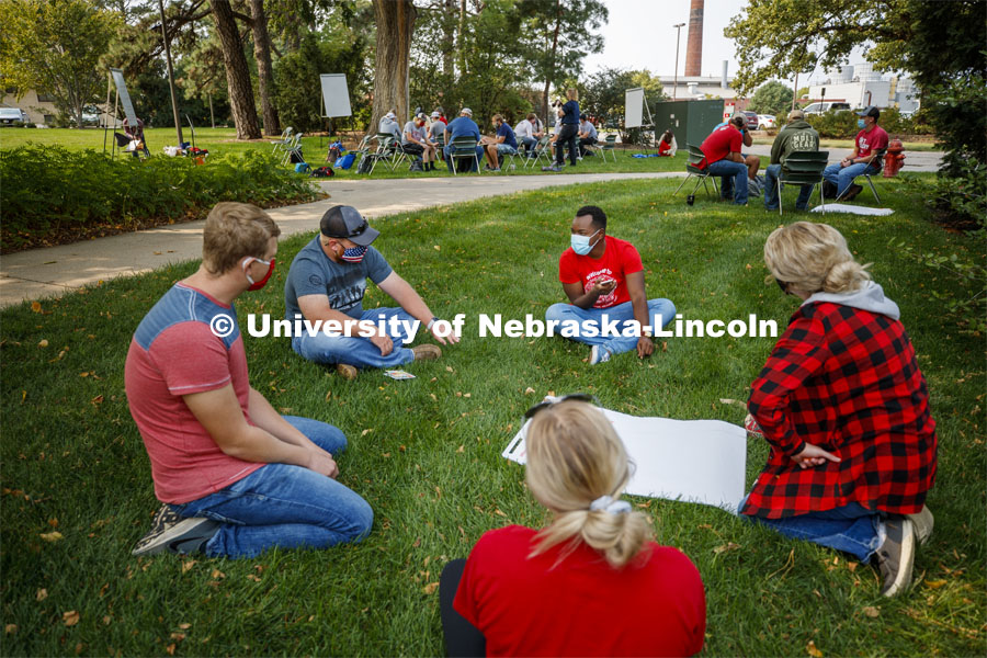 Student work in groups to brainstorm their strategies. Assistant Professor Andrea Basche teachers her AGRO 405 - Crop Management Strategies class in the green space west of the Plant Sciences Hall. September 17, 2020. Photo by Craig Chandler / University Communication.