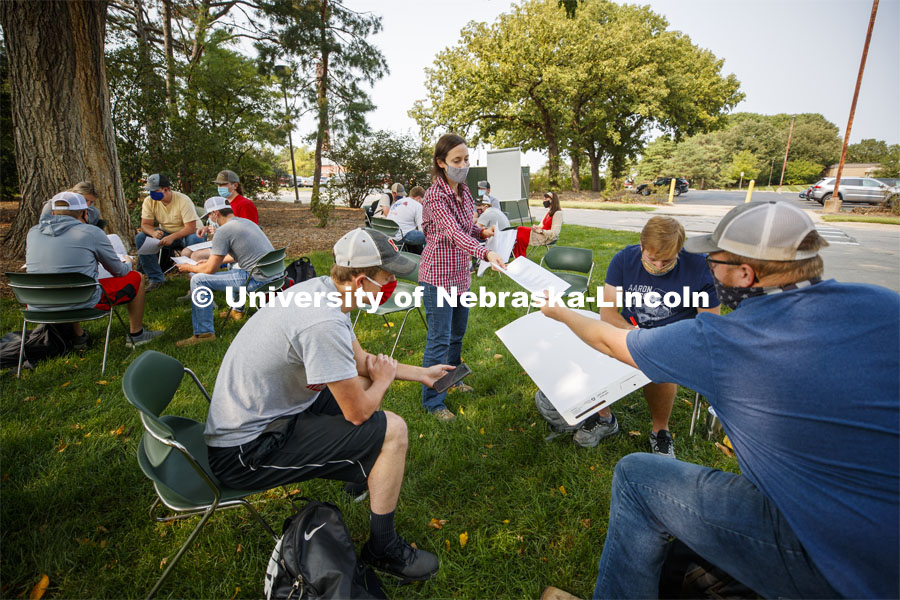 Assistant Professor Andrea Basche teachers her AGRO 405 - Crop Management Strategies class in the green space west of the Plant Sciences Hall. September 17, 2020. Photo by Craig Chandler / University Communication.