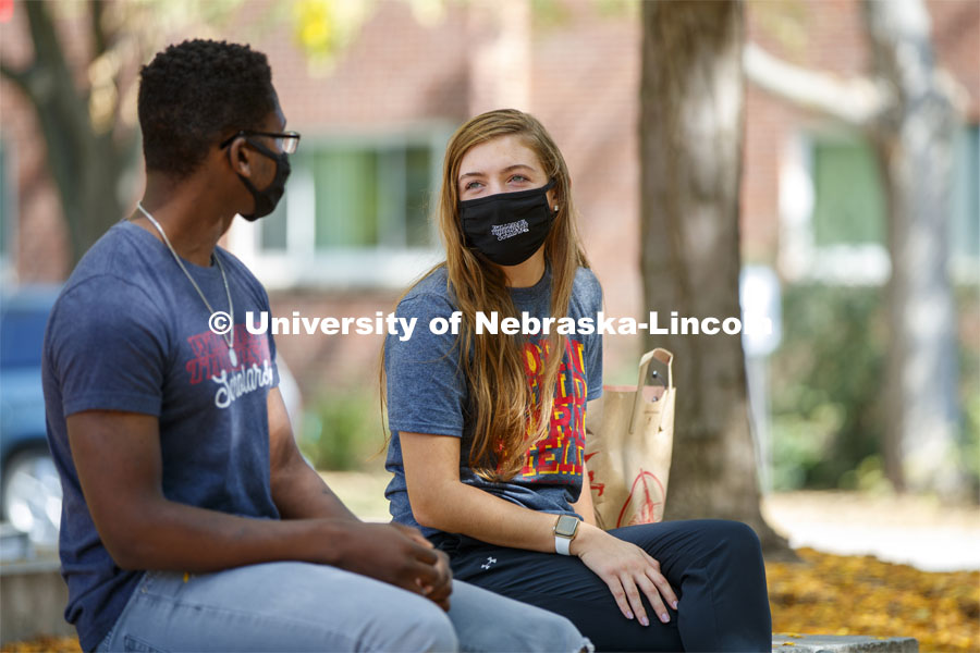 Megan Nickolite talks with Qasim Eissa outside the Nebraska Union. City Campus. September 23, 2020 Photo by Craig Chandler / University Communication.