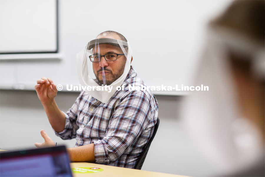 Jordan Soliz teaches his Social Identity and Intergroup Communication course. All those in the class wear special face shields to aid a hearing-impaired student. September 23, 2020. Photo by Craig Chandler / University Communication.