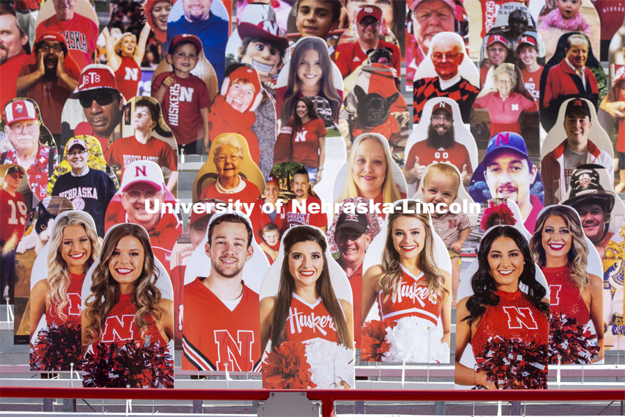 Members of the Husker Cheer Squad have front row seats for the home games. More than 6,000 corrugated plastic cutouts fill the lower level of east stadium, the tunnel walk, and part of north stadium to remind the Huskers who has the Greatest Fans in College Football. November 12, 2020. Photo by Craig Chandler / University Communication.