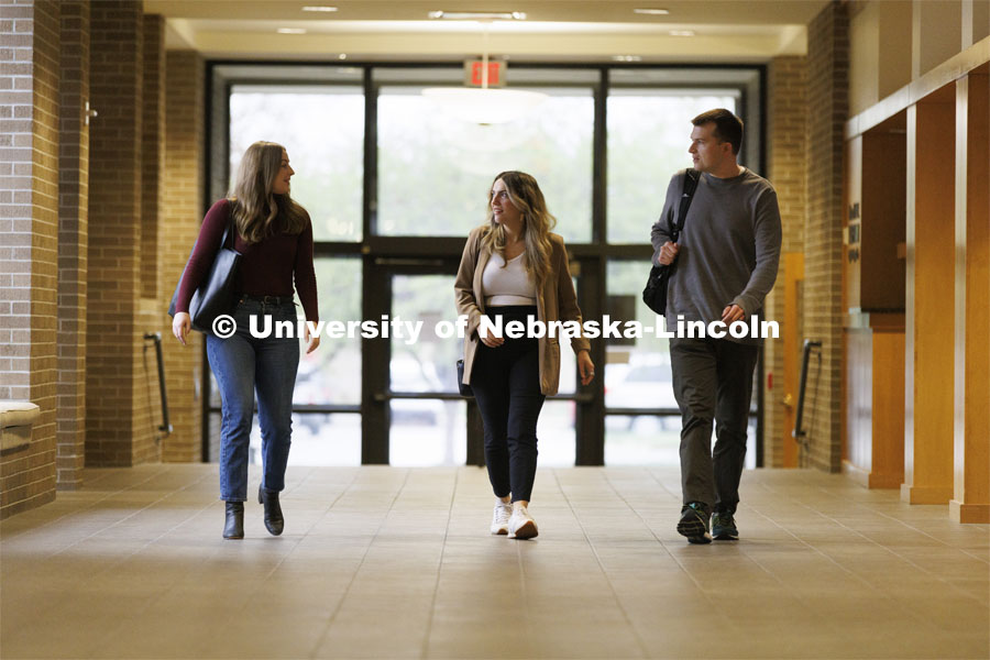 Students walking to class in McCollum Hall. College of Law photo shoot. April 20, 2022. Photo by Craig Chandler / University Communication.