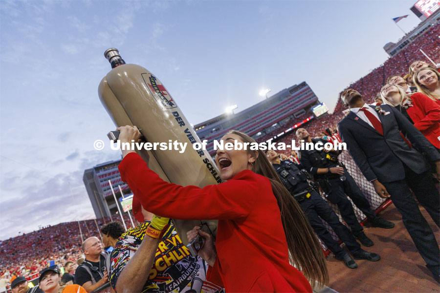 Members of the Homecoming Court get the chance to launch a hotdog with Der Viener Schlinger. Nebraska vs. Indiana football Homecoming game. October 1, 2022. Photo by Craig Chandler / University Communication.