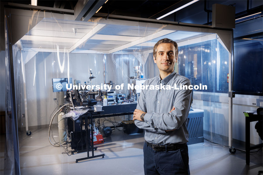 Mohammad Ghashami, Assistant Professor in Mechanical and Materials Engineering, is a CAREER winner. He is working on technology that will enable next-generation nanodevices (he's the leader of the Nebraska Nanoscale Energy Engineering Lab). He is photographed in his Engineering Research Center lab. The equipment is surrounded by a dust proof air system. April 5, 2023. Photo by Craig Chandler / University Communication.