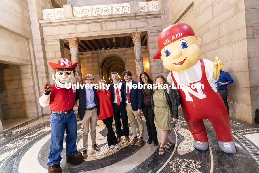 The ASUN contingent poses with Herbie Husker and Lil’ Red at the I Love NU advocacy event at the Nebraska State Capitol. April 5, 2023. Photo by Craig Chandler / University Communication.