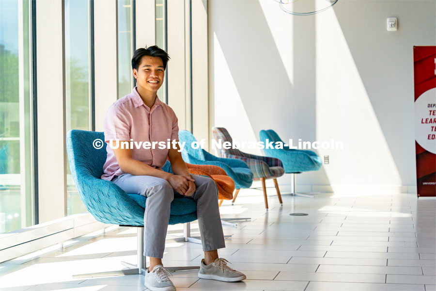 Andre Nguyen, Junior in Nutritional Science and Dietetics, smiles for a photo inside the Gwendolyn A. Newkirk Human Sciences Building. APIDA Heritage Month Feature. He is also a member of DMNV Lion Dance. May 16, 2023. Photo by Jonah Tran/ University Communication