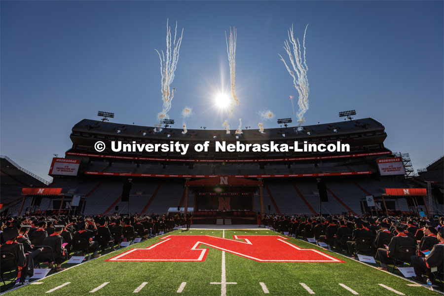 Fireworks explode in the air on the north side of Memorial Stadium. Undergraduate commencement at Memorial Stadium. May 20, 2023. Photo by Craig Chandler / University Communication.