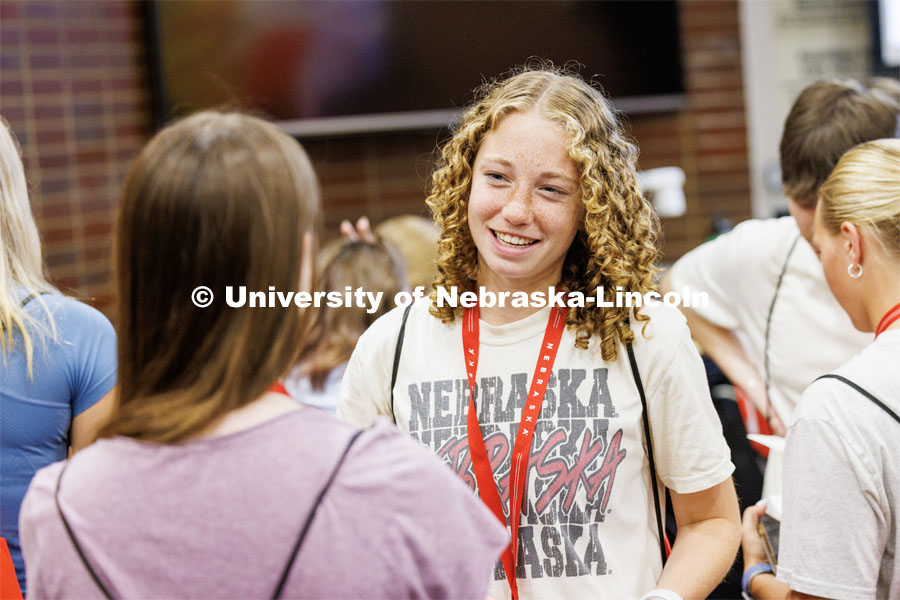 Izzy Apel answers a question from another NSE student as they learn about their fellow Huskers. New Student Enrollment. June 7, 2023. Photo by Craig Chandler / University Communication.
