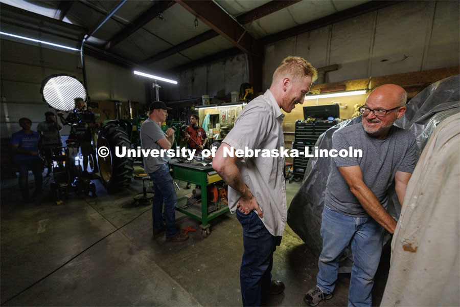 Richard Endacott, right, discusses a scene with Chicago actor Calvin Chervinko. Filming of the movie using UNL students as the production crew. Richard Endacott earned multiple awards for his screenplay, "Turn Over." Story about keeping the family farm operating in the modern era as two brothers come together via restoring an old tractor to help fund their operations. August 9, 2023. Photo by Craig Chandler / University Communication.