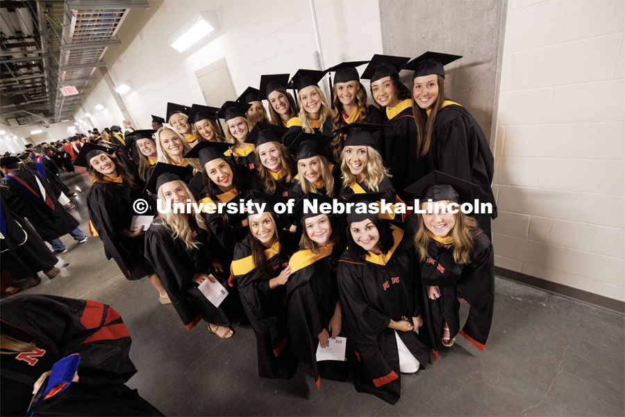 The masters graduates in Speech-Language Pathology and Audiology pose for a photo before the ceremony. The University of Nebraska–Lincoln is conferring 588 degrees during the combined graduate and undergraduate commencement ceremony at Pinnacle Bank Arena. August 12, 2023. Photo by Craig Chandler/ University Communication.