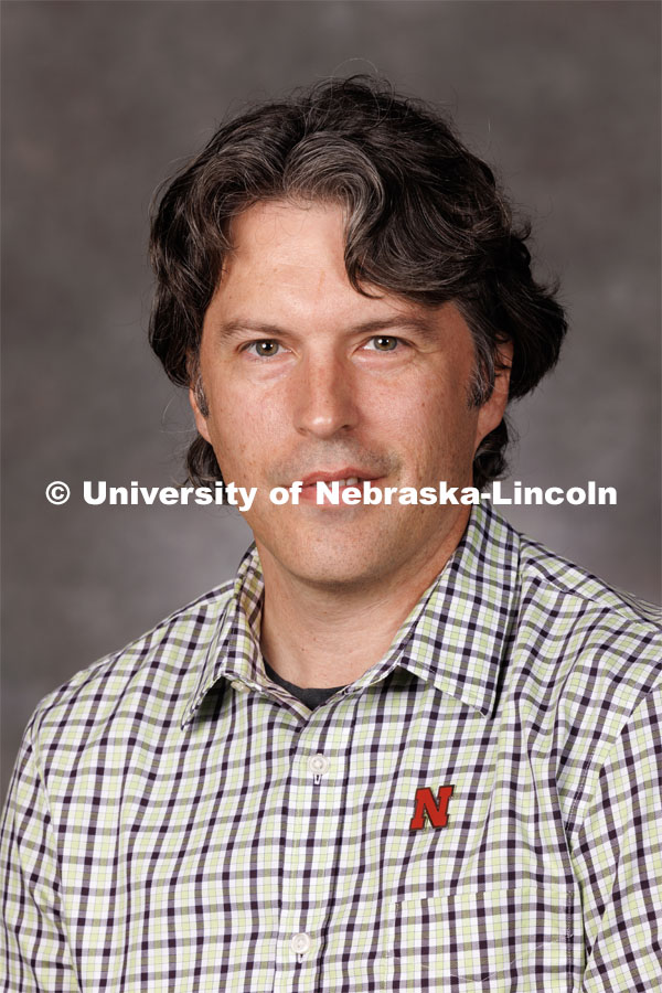 Studio portrait of John Nelson, Extension Educator, Nebraska Extension. 2023 New Faculty Orientation. August 16, 2023. Photo by Craig Chandler / University Communication.