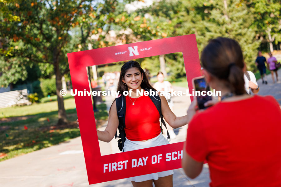 Caroline Granger, a freshman from Omaha, has a photo taken on the first day of classes for fall semester. August 21, 2023. Photo by Craig Chandler / University Communication.