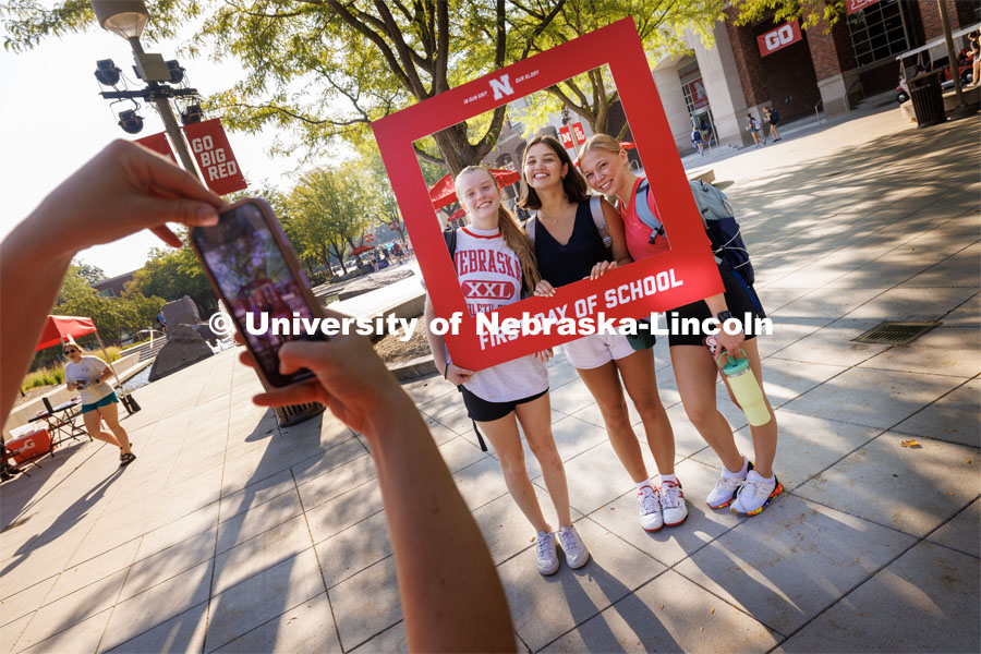 Kate Dobson, Liem Wills and Ava Wells have their photo taken on the first day of classes for fall semester. August 21, 2023. Photo by Craig Chandler / University Communication.