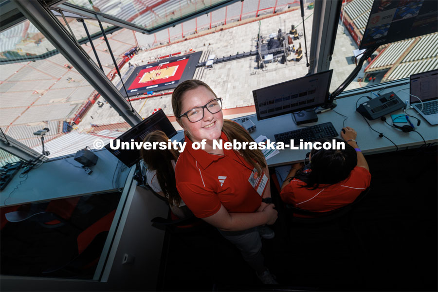 Melanie Gentrup works for the Huskers making sure the graphics are shown properly on the stadium scoreboards. Volleyball Day in Nebraska. August 30, 2023. Photo by Craig Chandler / University Communication.