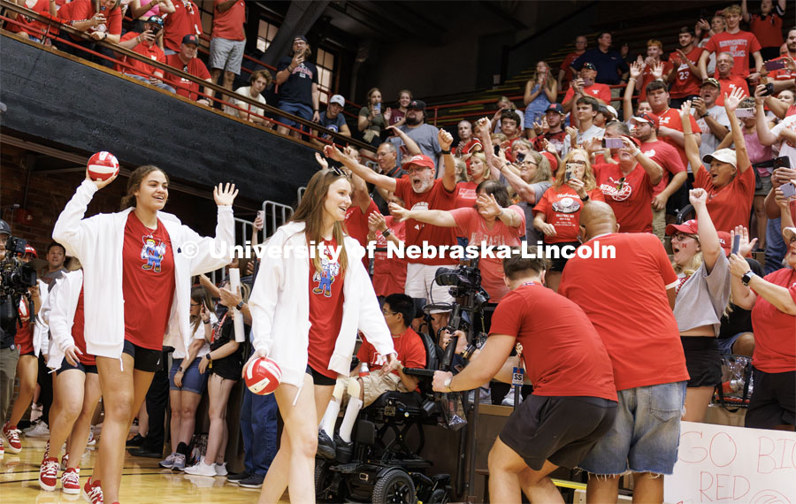 The volleyball team enters the Rally at the Coliseum. Volleyball Day in Nebraska. Husker Nation stole the show on Volleyball Day in Nebraska. The announced crowd of 92,003 surpassed the previous world record crowd for a women’s sporting event of 91,648 fans at a 2022 soccer match between Barcelona and Wolfsburg. Nebraska also drew the largest crowd in the 100-year history of Memorial Stadium for Wednesday’s match. August 30, 2023. Photo by Craig Chandler / University Communication.