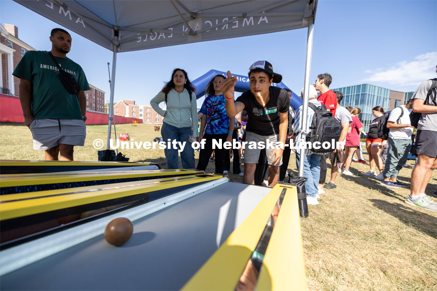 Gary Elias plays skee-ball at Hanging with the Huskers event. September 29, 2023. Photo by Dillon Galloway for University Communications.