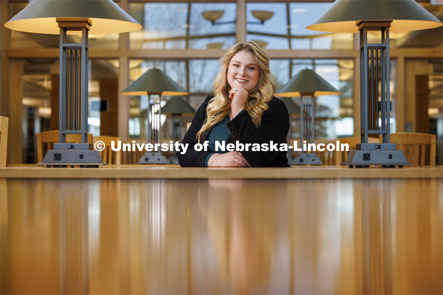 Delaney Doyle, a second-year law student from Omaha, poses for a photo in the Marvin & Virginia Schmid Law Library. Photo for Women’s History Month. March 15, 2024. Photo by Craig Chandler / University Communication and Marketing.