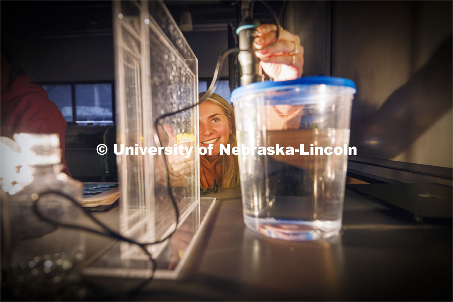 Ashlin Broz, a freshman from Hayes Center, Nebraska, checks on the oxygen sensor during a photosynthesis experiment in LIFE 120L - Fundamentals of Biology lab in Manter Hall. March 26, 2024. Photo by Craig Chandler / University Communication and Marketing.