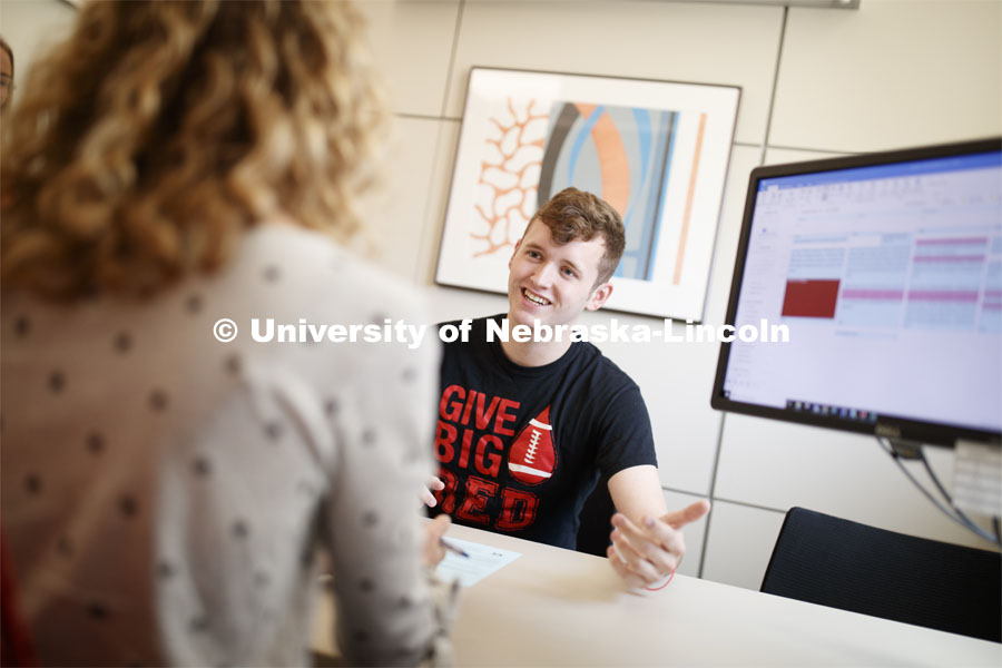 Students working with an academic advisor at the Explore Center. Explore Center photo shoot. Septemb