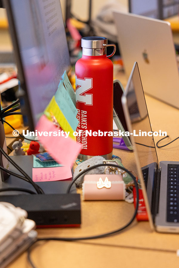 250414_Raikes_6.jpg A Raikes School bottle sits among the table clutter of a Raikes School Design Team's workspace. Apri