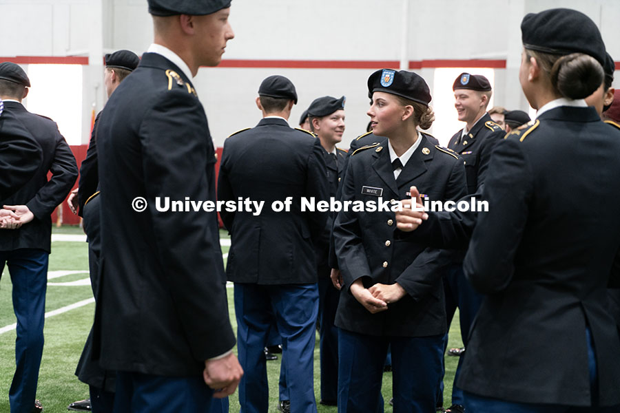 250417_ROTC_Review_05.jpg ROTC students chat before the ceremony begins. Joint Service Chancellor’s Review of the ROTC Cadet