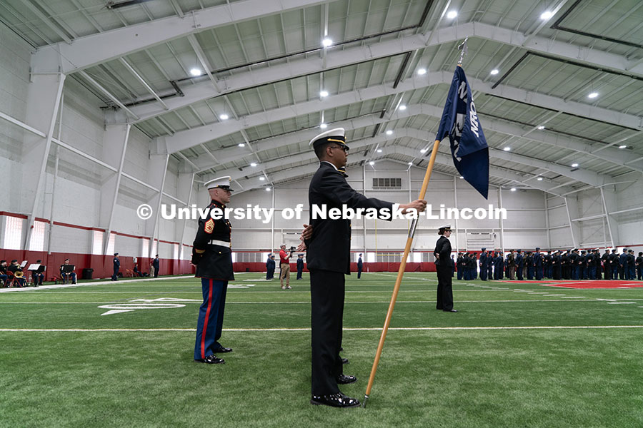 250417_ROTC_Review_17.jpg A cadet holds a flag at Chancellor Rodney D. Bennett's ROTC Review. Joint Service Chancellor’s Rev