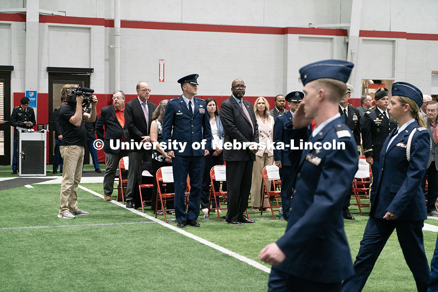 250417_ROTC_Review_24.jpg Chancellor Bennett watches on as ROTC students march to conclude the ceremony. Joint Service Chancel