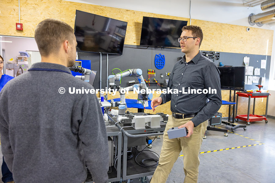 250414_Robotics_Fellows_2.jpg Riley Reynolds, a Husker alumnus and surgical robotics engineer, discusses his Nebraska Innovation S