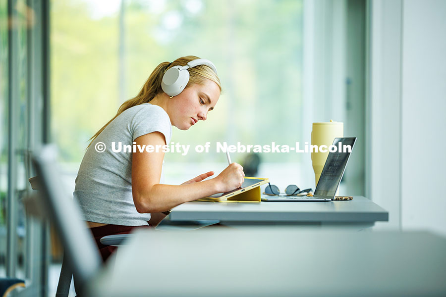 250507_East_Campus_195.jpg Amelia Stamm, a Junior Speech-Language Pathologist, studies for finals in the Dinsdale Family Learni