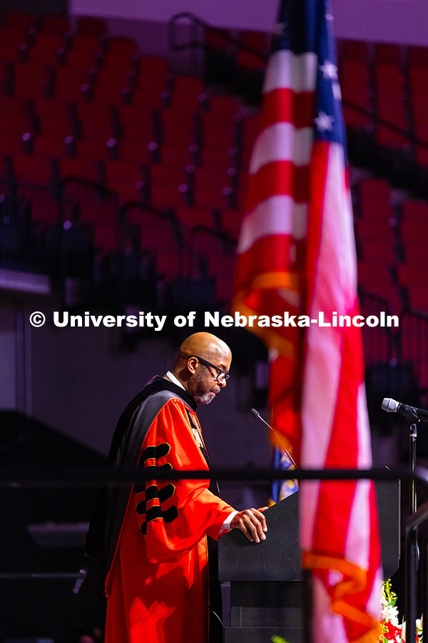250517_Commencement_1620.jpg Chancellor Rodney D. Bennett pauses while speaking at the podium to graduating students, their famil