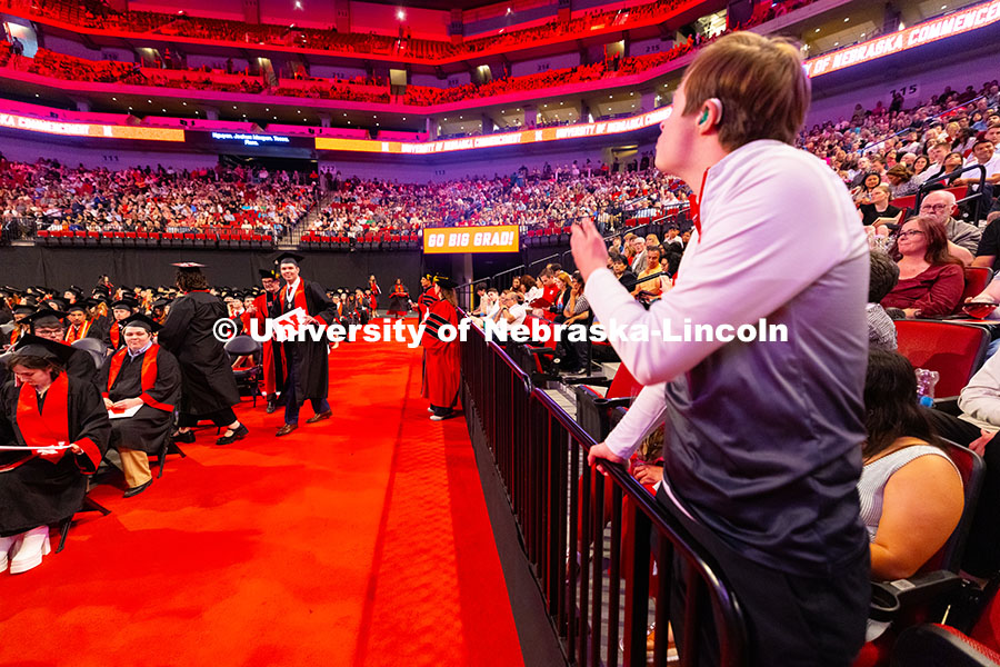 250517_Commencement_8444.jpg Nick Wright calls out from the stands in Pinnacle Bank Arena to his brother Palmer as he returns to