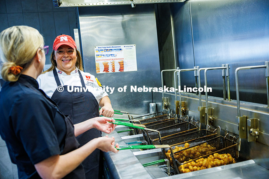 Victoria Dodd (left), the Assistant Food Service Manager, speaks with Paige Knebel, the Chef de Cuis