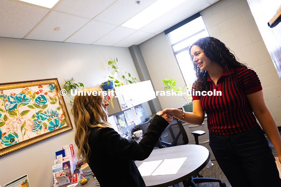 250624_Navigators_0864.jpg Stephanie Cerrato-Rodriguez speaks with Rose Zaske, a junior studying advertising and public relatio
