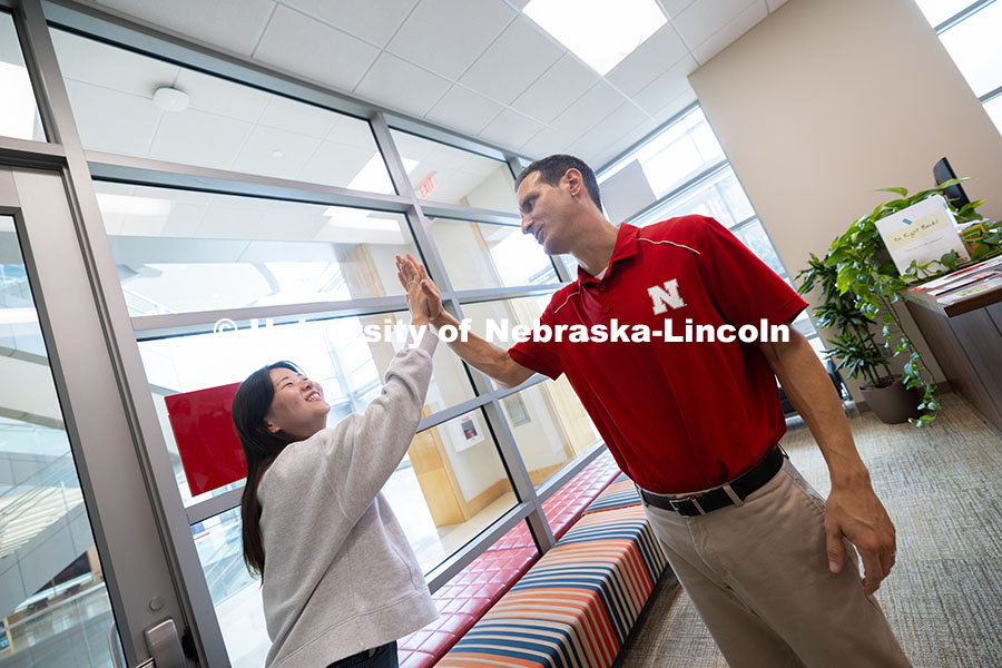 250624_Navigators_1324.jpg Mireu Ryu gives a high-five to Parker Reed, one of the academic navigators for the College of Busine