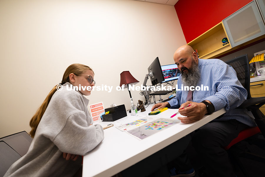 250625_CAST_Team_1680.jpg Joel Cardenas, an academic success coach in the Center for Academic Success and Transition, meets wi