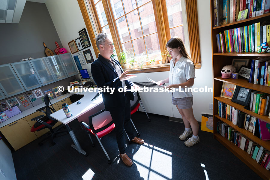 Robert Russell, director of the Center for Academic Success and Transition, chats with Kyanne Casper