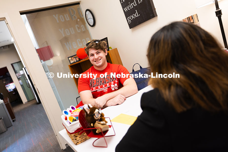 250625_CAST_Team_1838.jpg Jacob Behnk, a senior studying Spanish and global studies, speaks with Mari Beck in her office in th